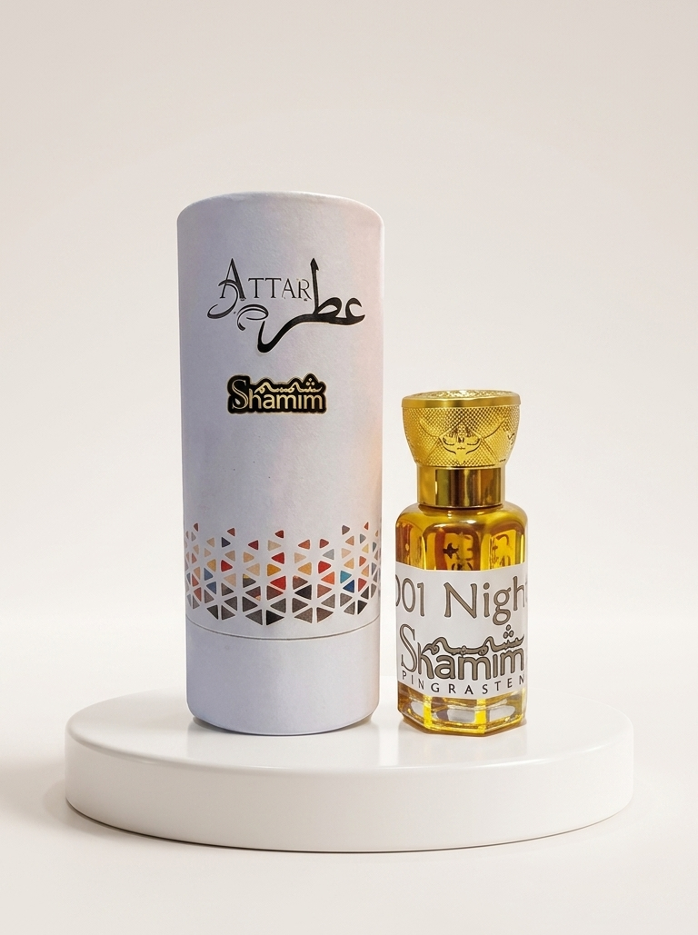 Shamim Attar 101 Night Shams al-Aqsa perfume bottle with a gold cap next to its white cylindrical packaging box, displayed on a white round pedestal.