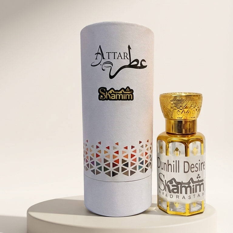 A bottle of Attar Shammim perfume next to its white cylindrical packaging box, displayed on a round white pedestal against a warm beige background.