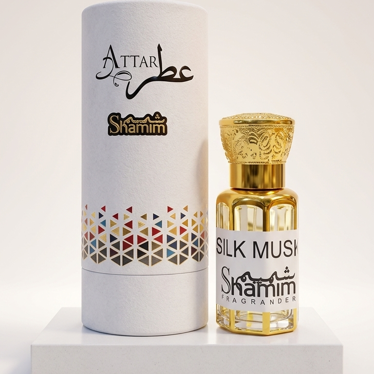A bottle of Attar Shammim Silk Mushroom fragrance next to its white cylindrical packaging box, displayed on a white pedestal against a light beige background.