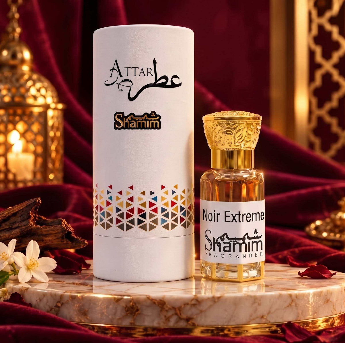 Noir Extreme by Tom Ford attar perfume oil in a clear amber-tinted glass bottle with ornate gold cap and label